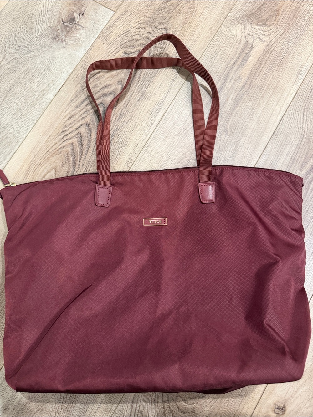Tumi Wine Red Nylon Tote with pass thru trolly